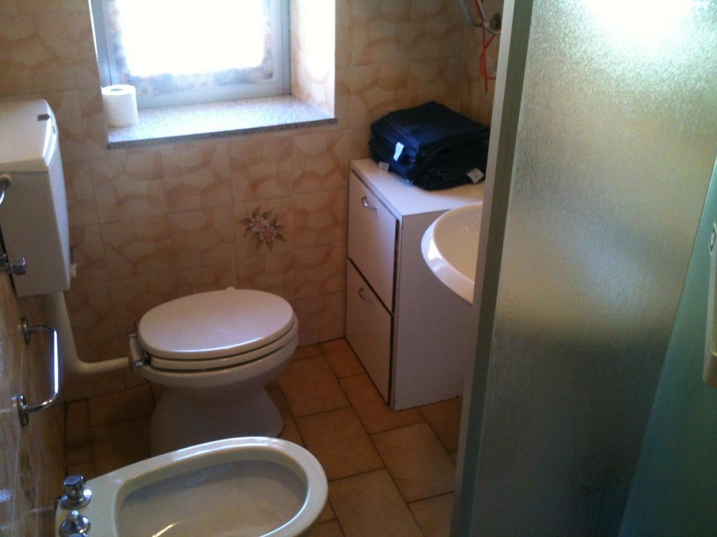 Апартаменты Casa Logo Плезио Номер фото